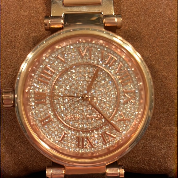 Michael Kors watch in Rose Gold. Never worn.